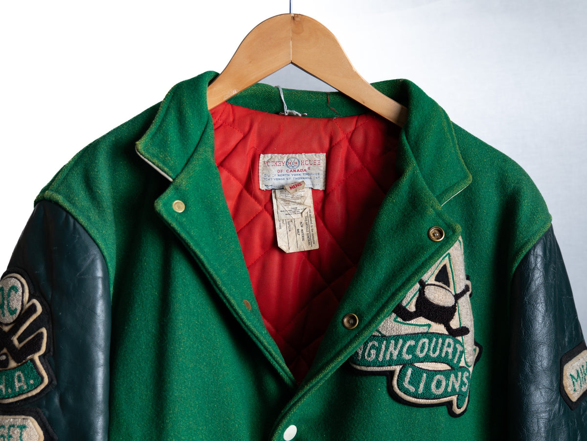 Green Patched Varsity Jacket with Dark Sleeves — garment photograph 3