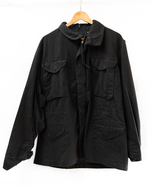 Black Four-Pocket Utility Jacket — garment photograph 1