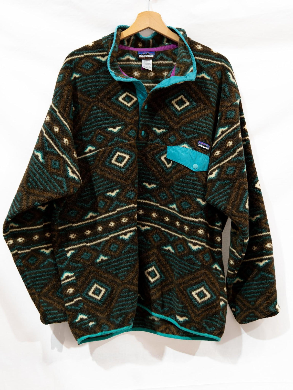 Geometric Pattern Fleece with Turquoise Trim — garment photograph 1