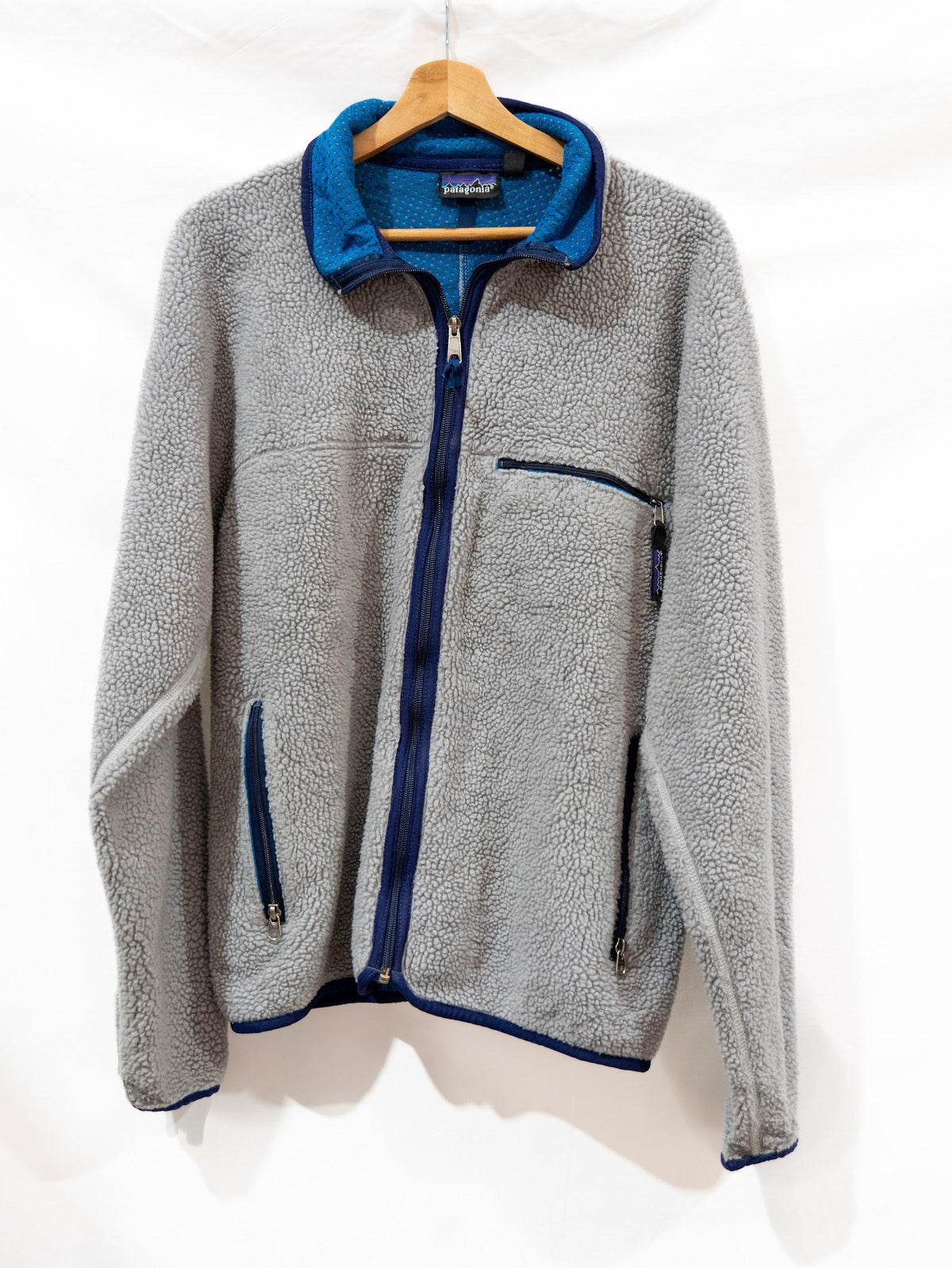 Grey Fleece with Navy Zip & Blue Collar — garment photograph 1