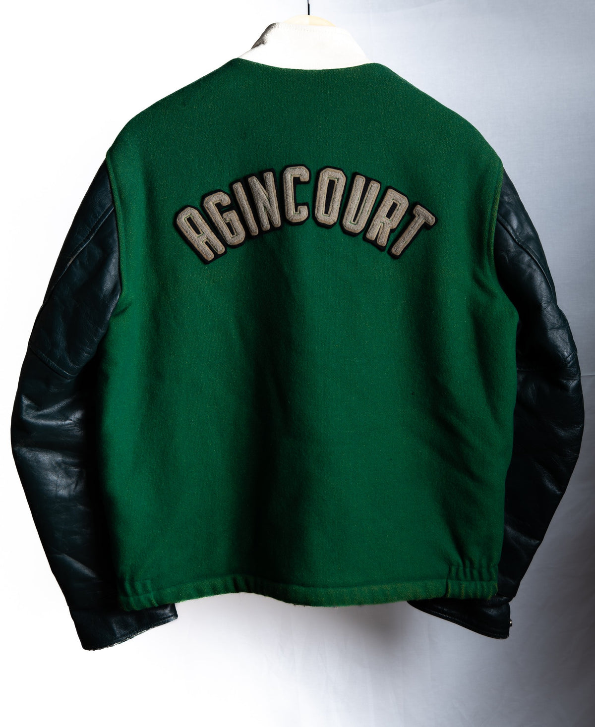 Green Patched Varsity Jacket with Dark Sleeves — garment photograph 2