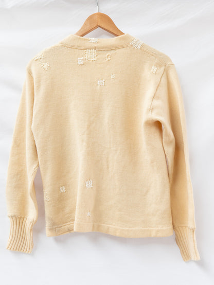 Cream Distressed Letterman Cardigan — garment photograph 3