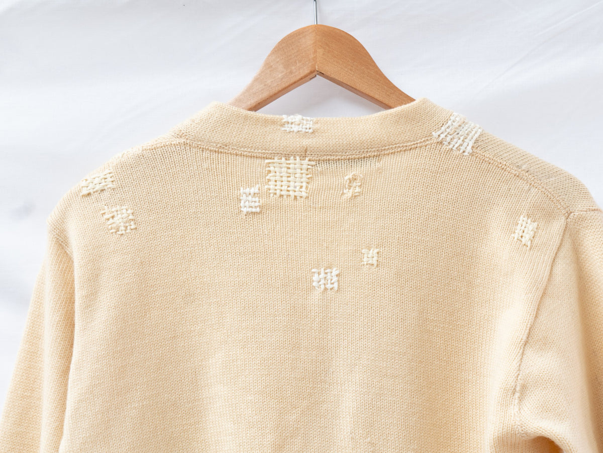 Cream Distressed Letterman Cardigan — garment photograph 4