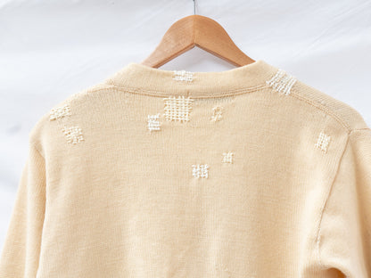 Cream Distressed Letterman Cardigan — garment photograph 4